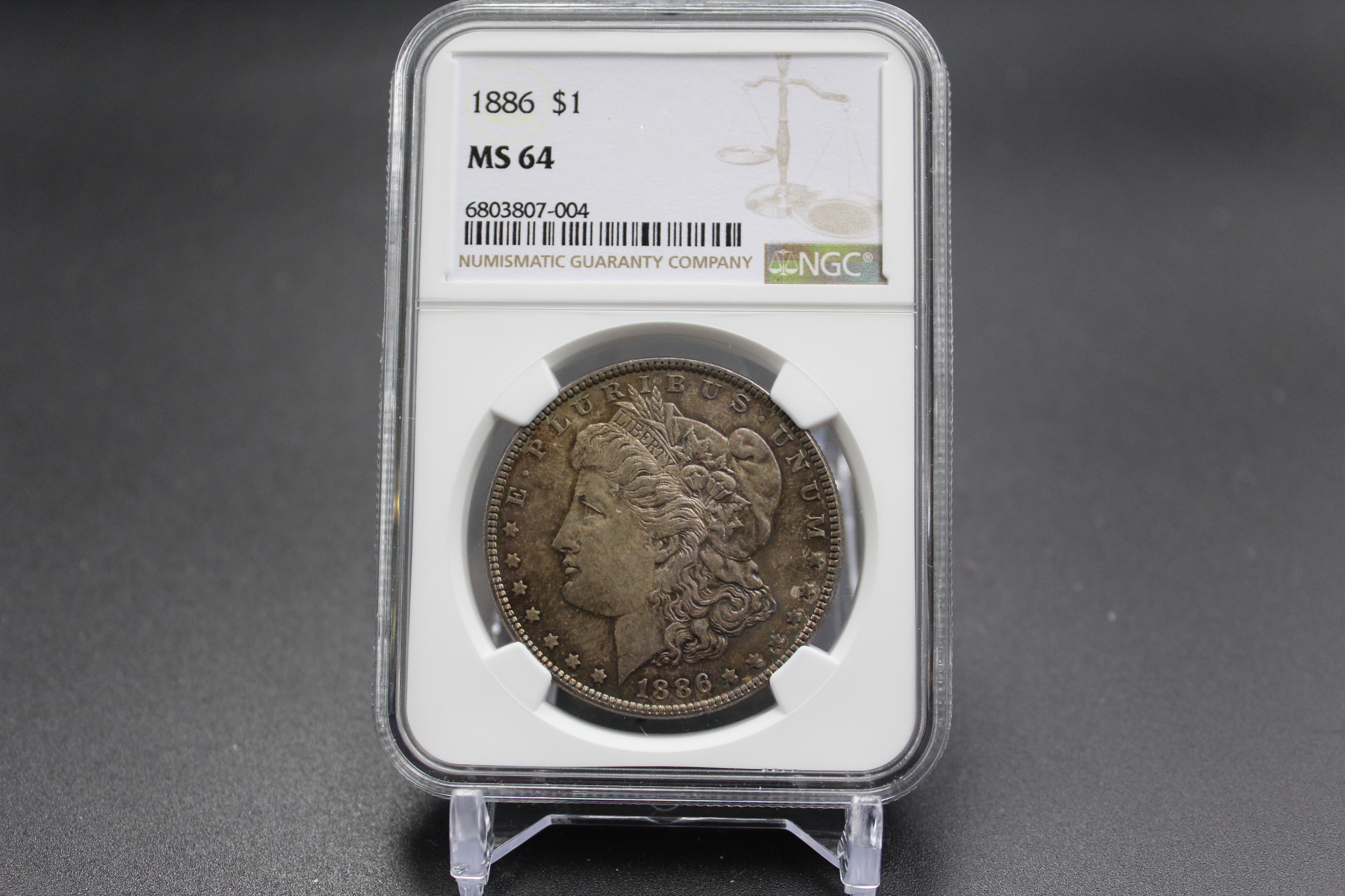 1886 Morgan Silver Dollar NGC MS-64 Toned